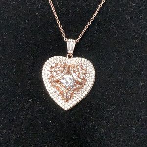NWOT rose gold Bella Luce pendant/locket.